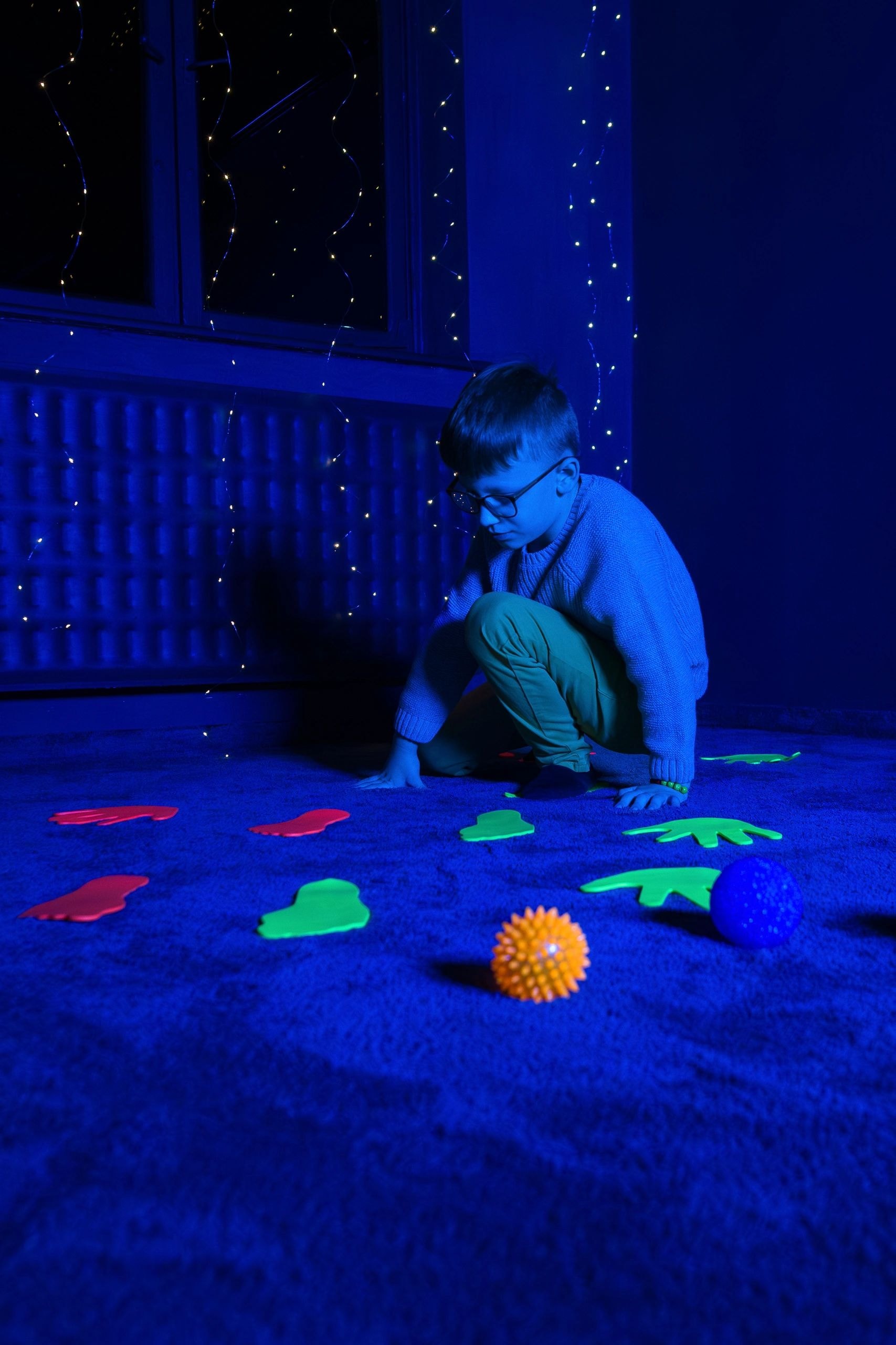 Therapist working one-on-one with a young child during occupational therapy